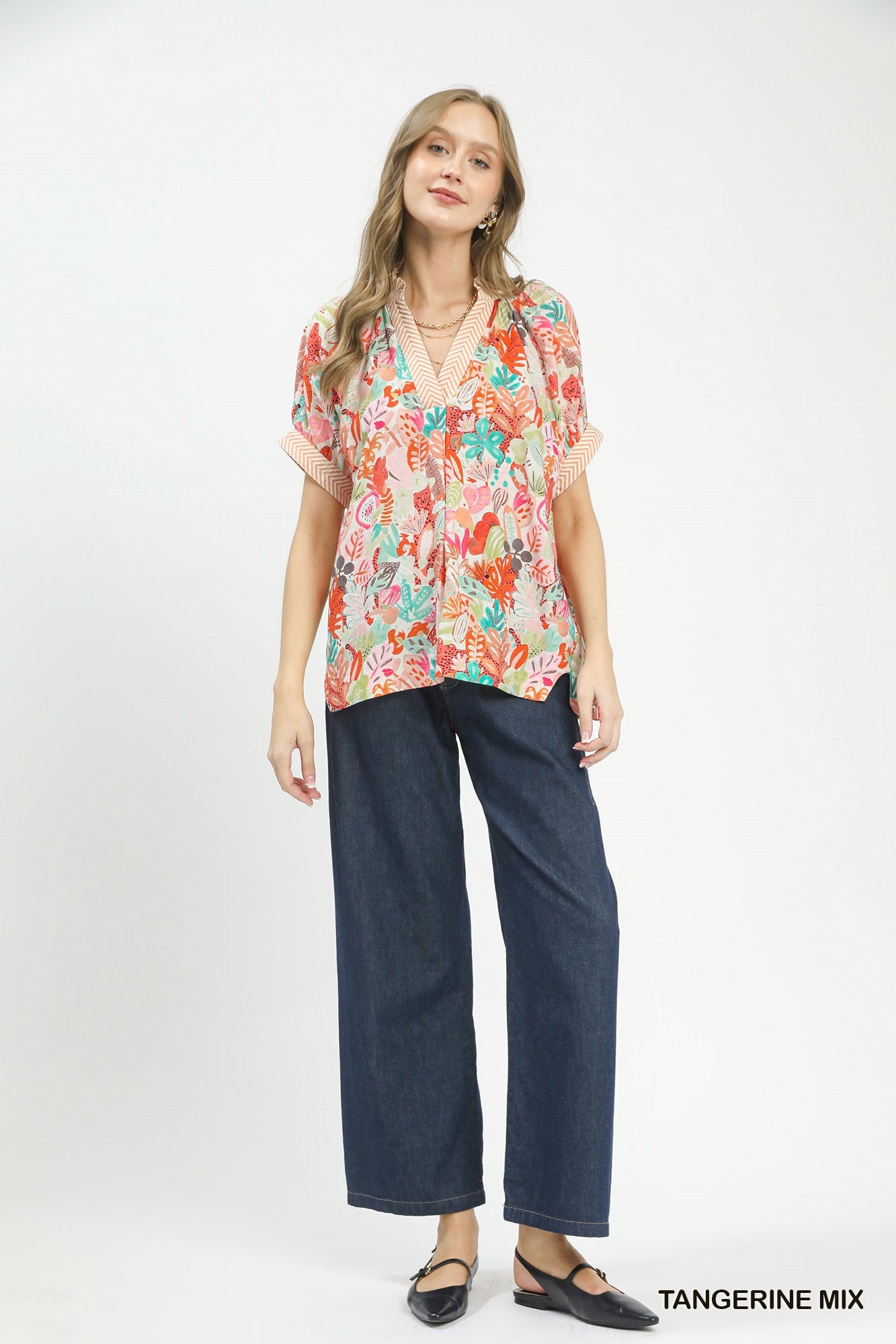 Umgee Mix Boho Printed V-Neck Top in vibrant tangerine and pattern, featuring a relaxed fit and stylish design.
