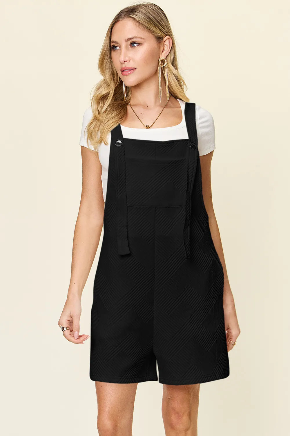 Tangerine double take full-size sleeveless romper with textured fabric, stylish and comfortable for casual wear.