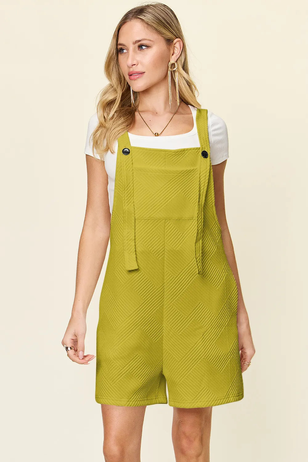 Tangerine double Take sleeveless romper with textured fabric and full-size fit, designed by Trendsi.