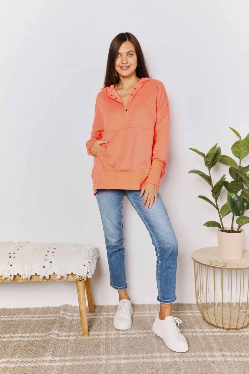 Tangerine orange Trendsi Double Take quarter-snap dropped shoulder hoodie with relaxed fit and dropped shoulder design.