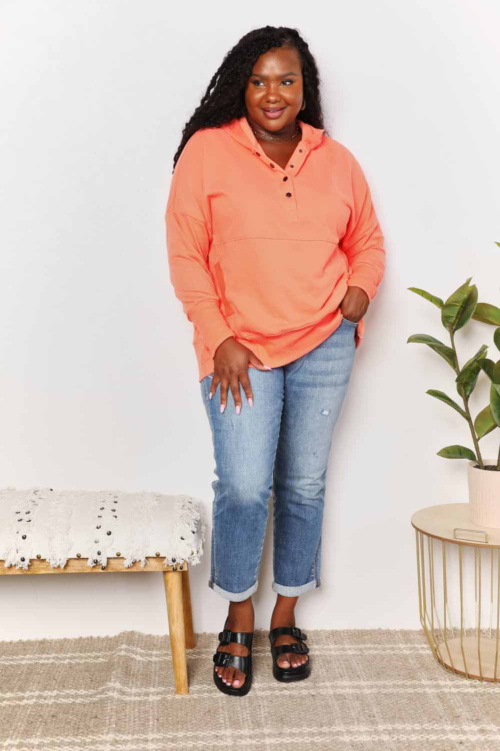 Tangerine double take quarter-snap dropped shoulder hoodie by Trendsi, featuring a relaxed fit and casual style.