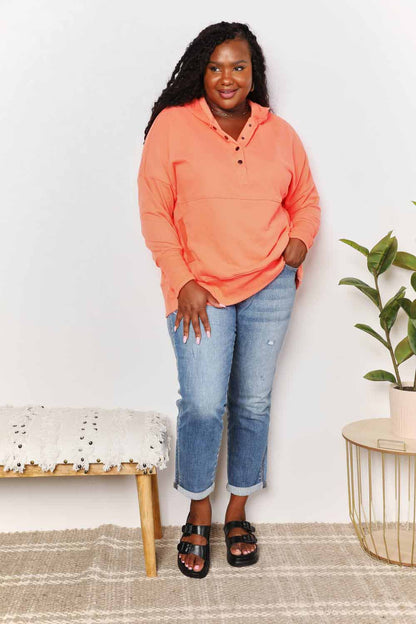 Tangerine double take quarter-snap dropped shoulder hoodie by Trendsi, featuring a relaxed fit and casual style.