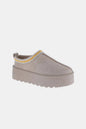Taupe Weeboo Platform Slip-On Boots by Trendsi with embroidered trim, showcasing stylish, comfortable footwear design.