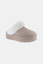 Taupe Weeboo snow slippers with thick rubber soles and fur trim, designed for warmth and comfort in winter.