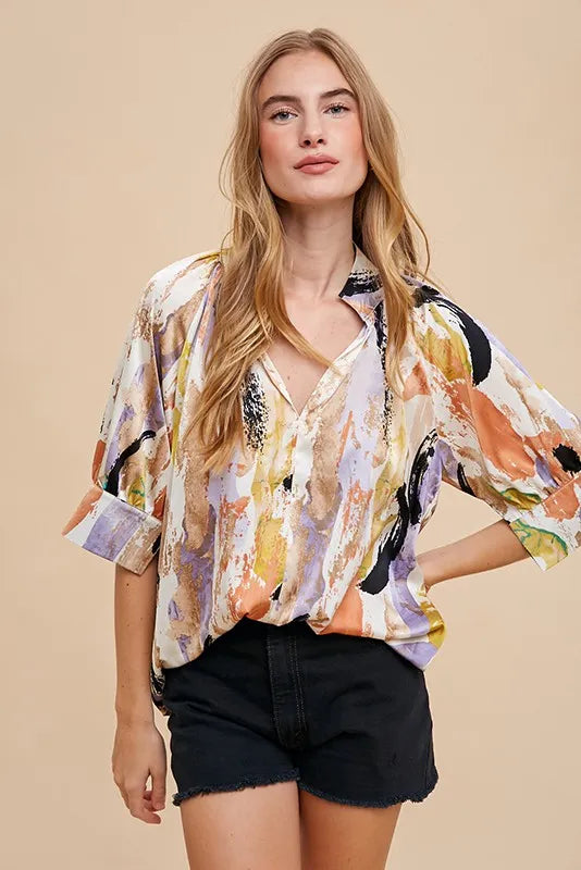 Multi-color printed Annie Wear V-neck open woven blouse top in taupe and lilac, featuring a stylish and lightweight design.