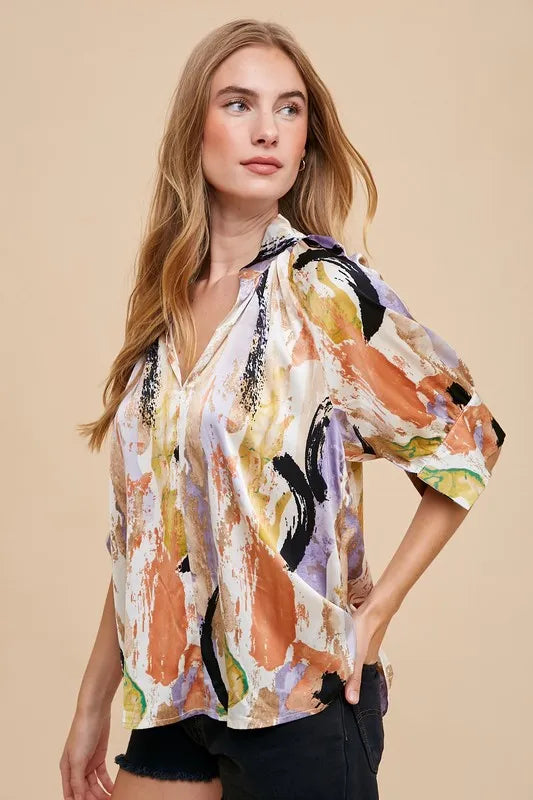 Annie Wear multicolor printed V-neck open woven blouse top in taupe and lilac, featuring a stylish and lightweight design.