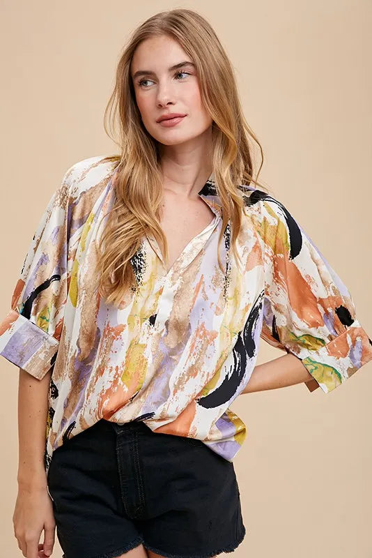 Multi-color printed Annie Wear V-neck open woven blouse top, casual stylish women's top with vibrant design.