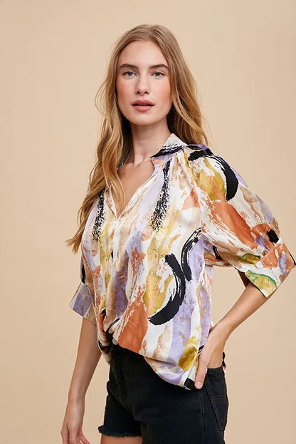 Multi-color printed Annie Wear V-neck open woven blouse top in taupe and lilac, featuring a stylish and lightweight design.