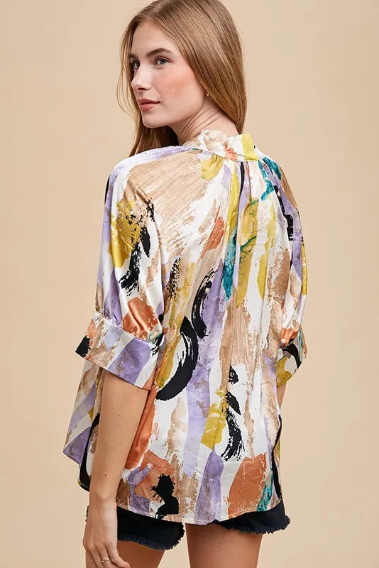 Trendsi Annie Wear multicolor printed V-neck open woven blouse top with long sleeves and relaxed fit.