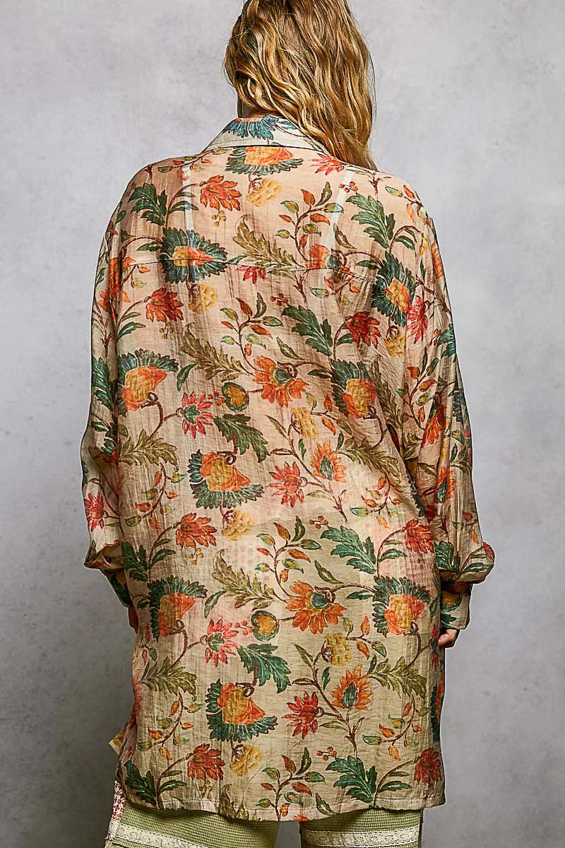 Taupe floral long sleeve metal button-down shirt by Trendsi featuring a stylish floral pattern and classic collar.