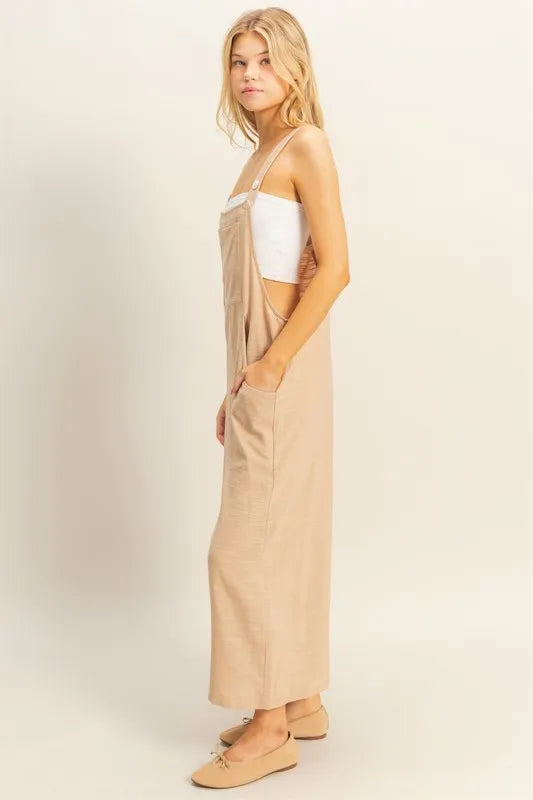 Taupe HYFVE textured wide-leg overall from Trendsi, featuring a relaxed fit and stylish design, shown on a model.