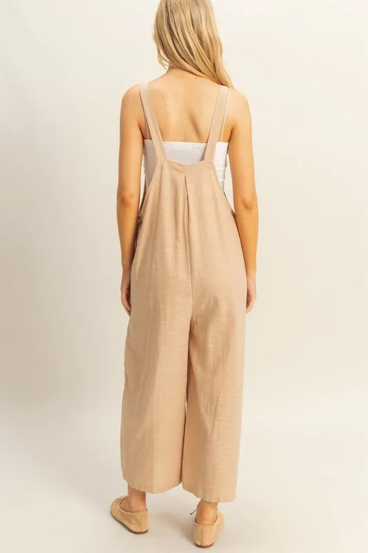 Taupe textured wide-leg overall by HYFVE, featuring a relaxed fit and adjustable straps, perfect for casual wear.