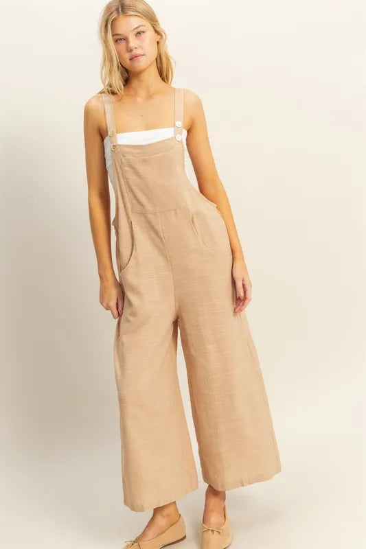 Taupe textured wide-leg overall by HYFVE featuring a relaxed fit and adjustable straps, styled for casual wear.