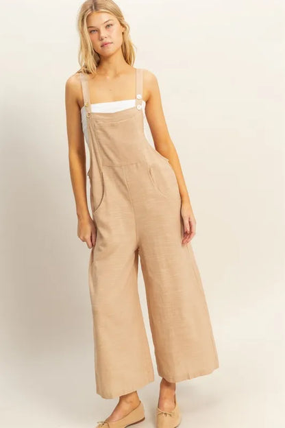 Taupe textured wide-leg overall by HYFVE featuring a relaxed fit and adjustable straps, styled for casual wear.