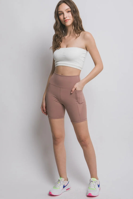 Taupe Love Tree high waist active shorts with seam detail, designed for comfort and style during workouts or casual wear.