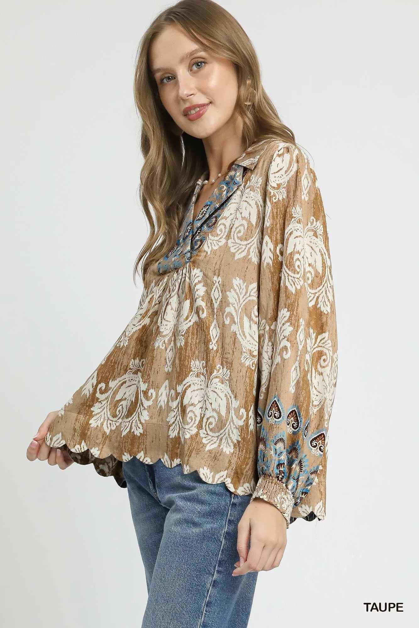 Taupe Umgee floral boho blouse with scalloped hem, showcasing flowy fabric and intricate floral pattern.