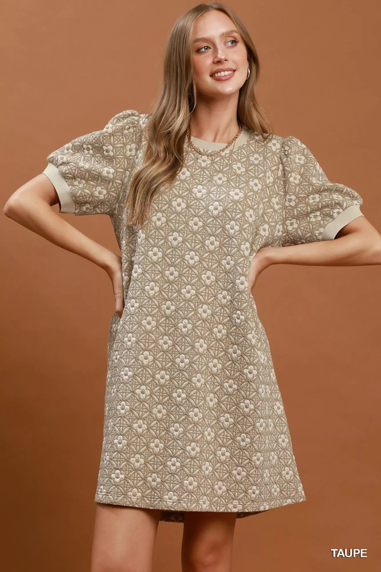 Taupe floral textured puff sleeve mini dress by Umgee, featuring a stylish design with puffed sleeves and a flattering fit.