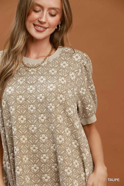 Taupe floral textured puff sleeve mini dress by Umgee, featuring a stylish silhouette and detailed fabric.