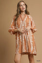 Taupe leaf print Umgee mini babydoll dress with notched neckline, featuring a flowy, lightweight design perfect for casual wear.