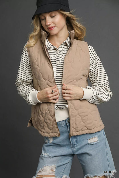 Taupe Umgee quilted zip-up vest with stand collar and front pockets, featuring a stylish and cozy design from Trendsi.