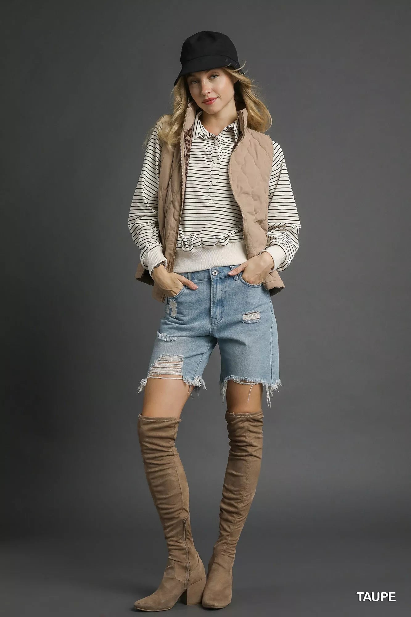 Taupe Umgee quilted zip-up vest with front pockets, styled for casual wear, by Trendsi.