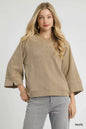 Taupe Umgee textured knit V-neck top by Trendsi, featuring a cozy fit and detailed knit pattern, perfect for casual wear.