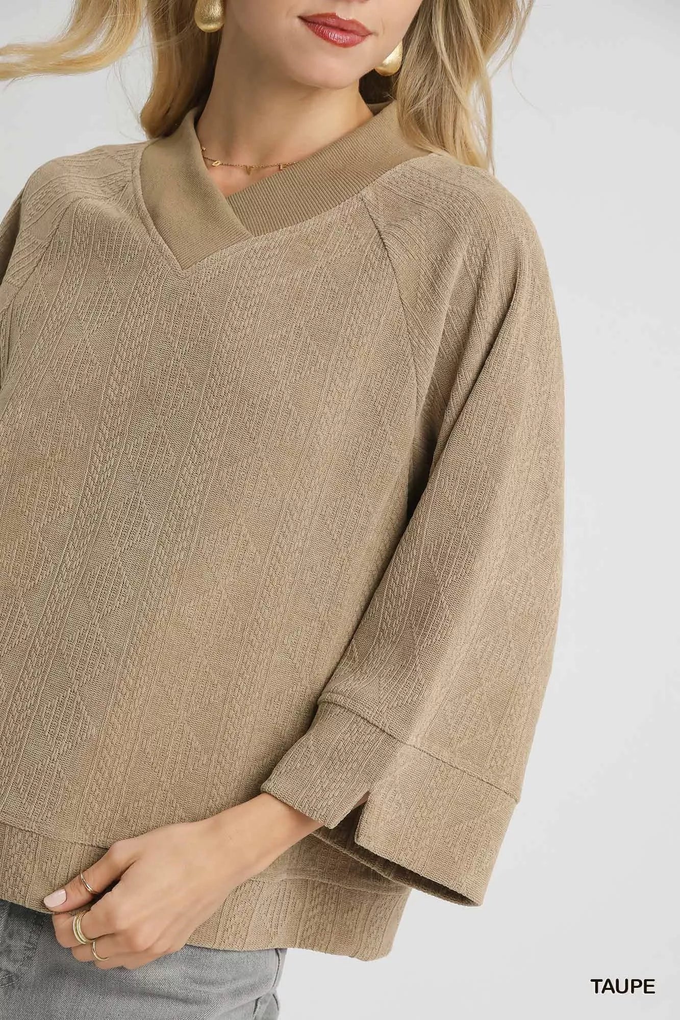 Taupe Umgee textured knit V-neck top, front view showing soft fabric and V-neck design, casual stylish women's knit top.