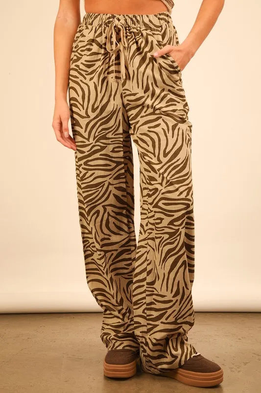 Taupe zebra print linen wide-leg pants from VERY J by Trendsi, featuring a relaxed fit and animal print design.