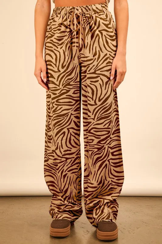Taupe zebra print linen wide leg pants by VERY J, featuring animal print design and relaxed fit, perfect for casual wear.