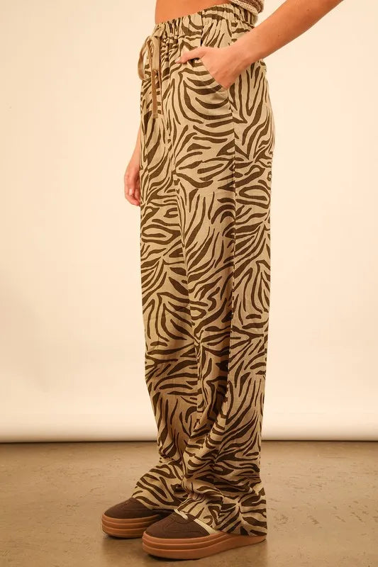 Taupe zebra print linen wide-leg pants by Very J, featuring animal print design and relaxed fit from Trendsi.