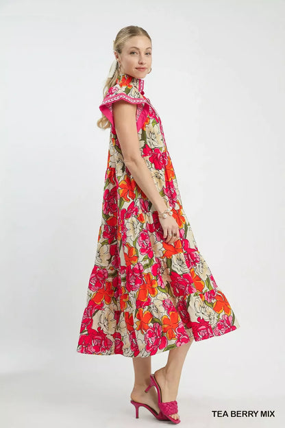 Trendsi Umgee Mix Bold Floral Tiered Midi Dress featuring vibrant floral pattern and flowing tiered design.