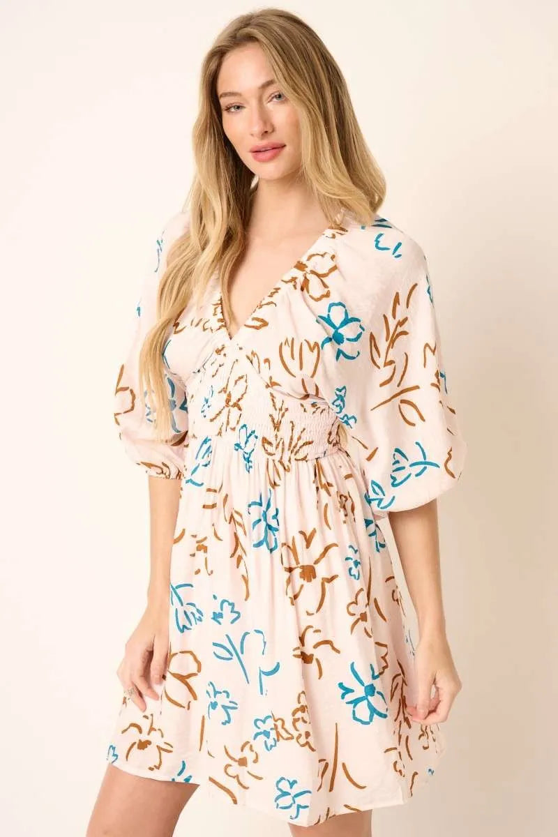 Teal flower print mock waist mini dress by Mittoshop, featuring a stylish, fitted silhouette perfect for casual or semi-formal wear.