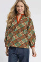 Teal and green abstract print ruffle neck top by Umgee, featuring a stylish design and feminine ruffle detail.