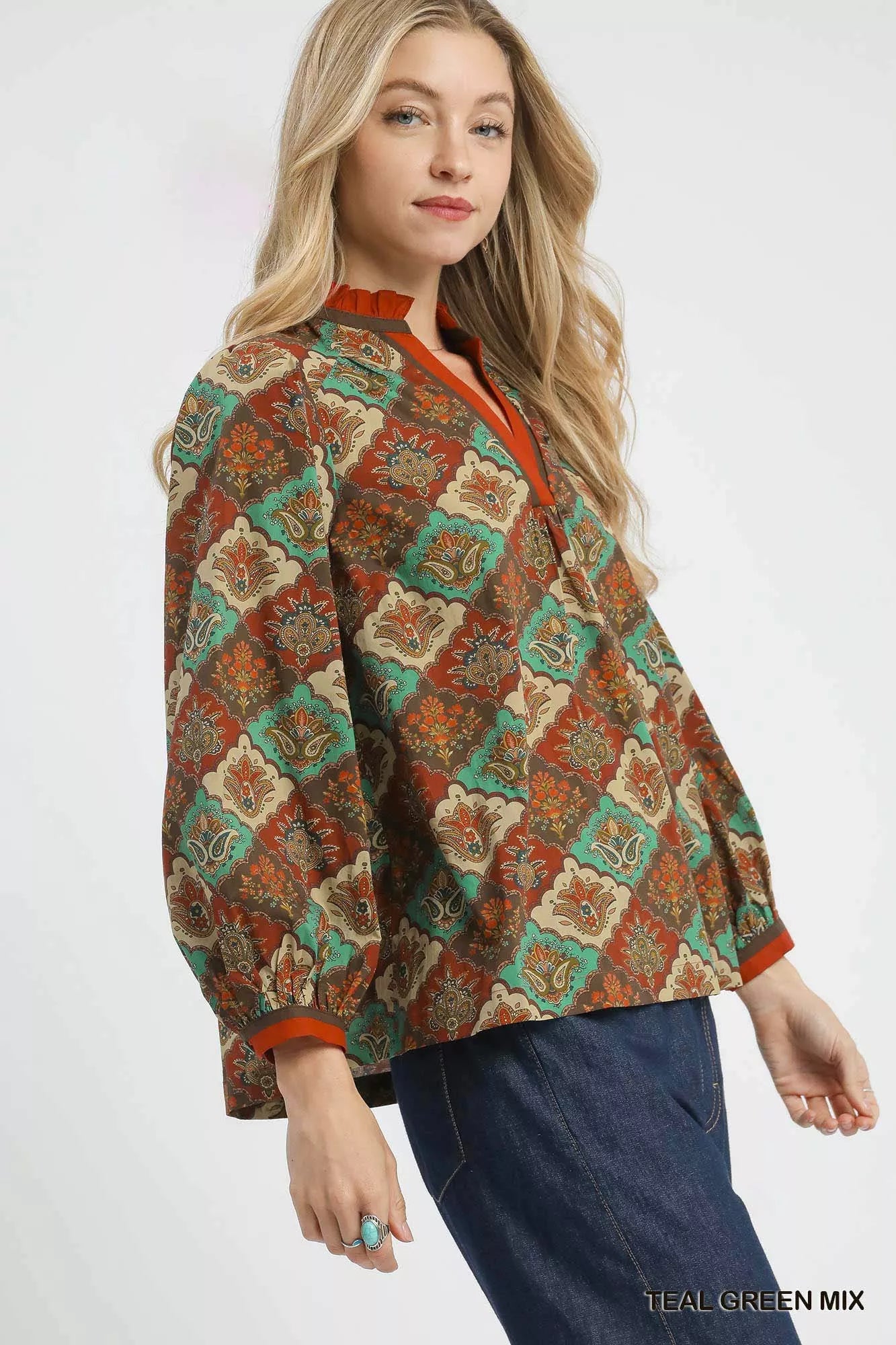Teal green mix Umgee abstract print ruffle neck top with long sleeves and relaxed fit, perfect for casual or chic outfits.