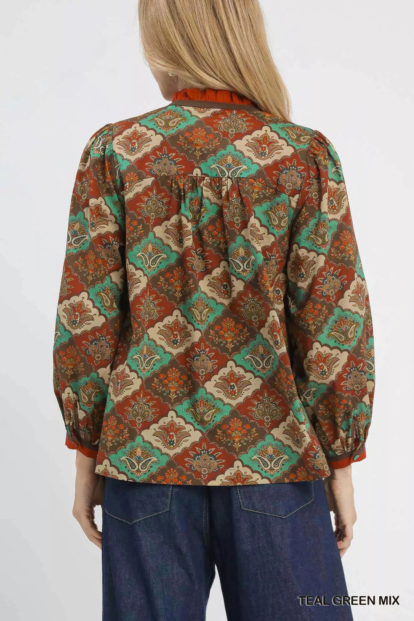 Teal green abstract print ruffle neck top by Umgee, featuring a stylish design and flowy fit, perfect for casual or dressy occasions.