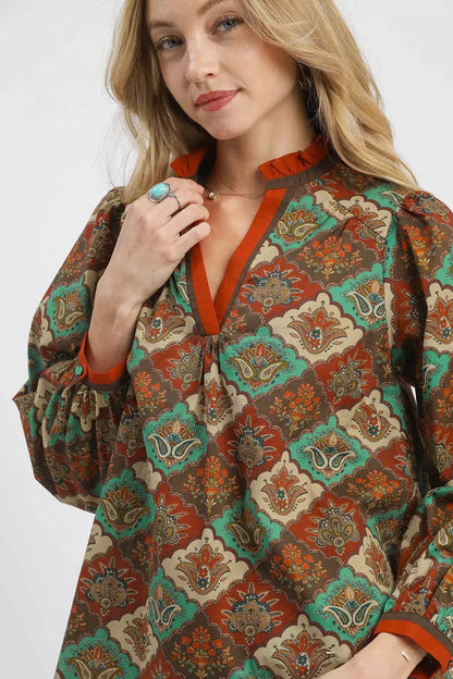 Teal and green abstract print ruffle neck top by Umgee, featuring a stylish design and flowy fabric.