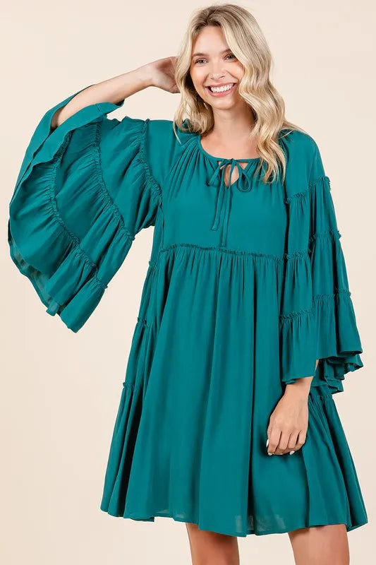 Teal green Mittoshop dress with tie neck, frill details, and bell sleeves, perfect for casual or dressy occasions.