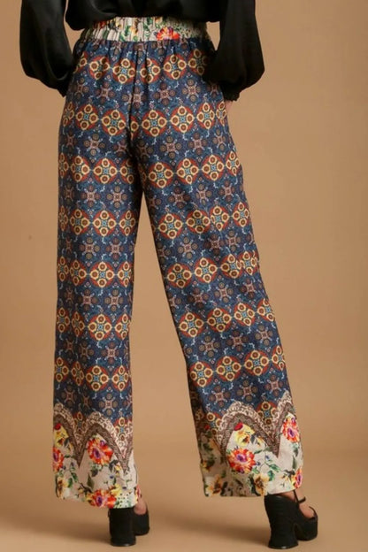 Plus size Umgee mixed print elastic waistband pants in teal, featuring a stylish full-length design and comfortable fit.