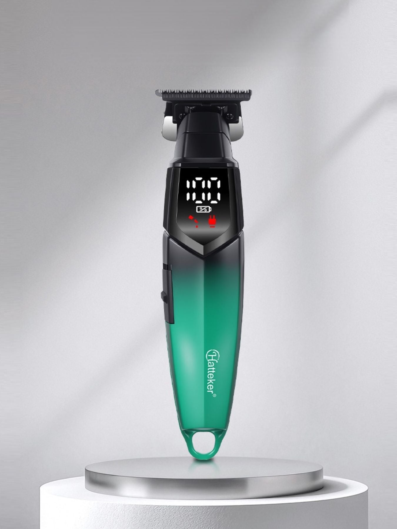 Teal cordless hair clipper with LED display and ergonomic design, suitable for precise hair trimming.