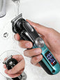Teal cordless hair clipper with LED display from Trendsi, featuring a sleek design and adjustable blade settings.