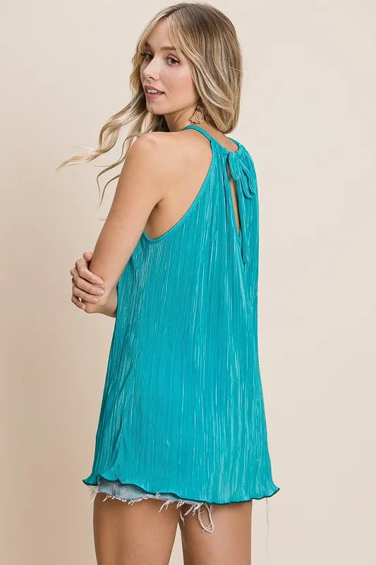 Teal BiBi Pleating Knit Halter Neck Top by Trendsi, close-up of the stylish pleated fabric and halter neckline on a model.