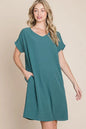 Teal BOMBOM V-Neck short sleeve dress with pockets, casual style, from Trendsi, shown on a mannequin.