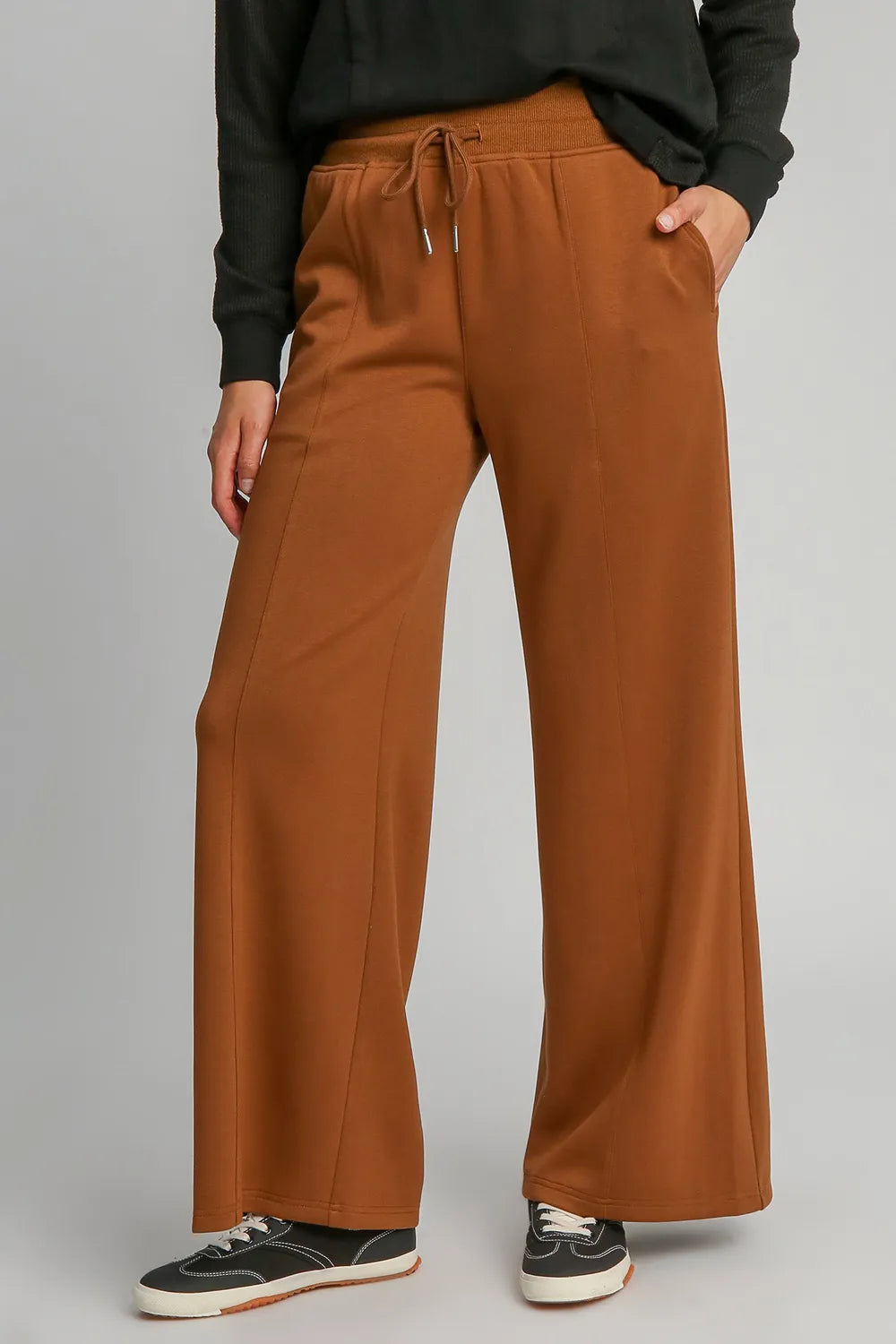 Terracotta Umgee drawstring wide-leg pants with pockets, casual and comfortable for everyday wear.