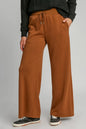 Terracotta Umgee drawstring wide-leg pants with pockets, casual and comfortable for everyday wear.