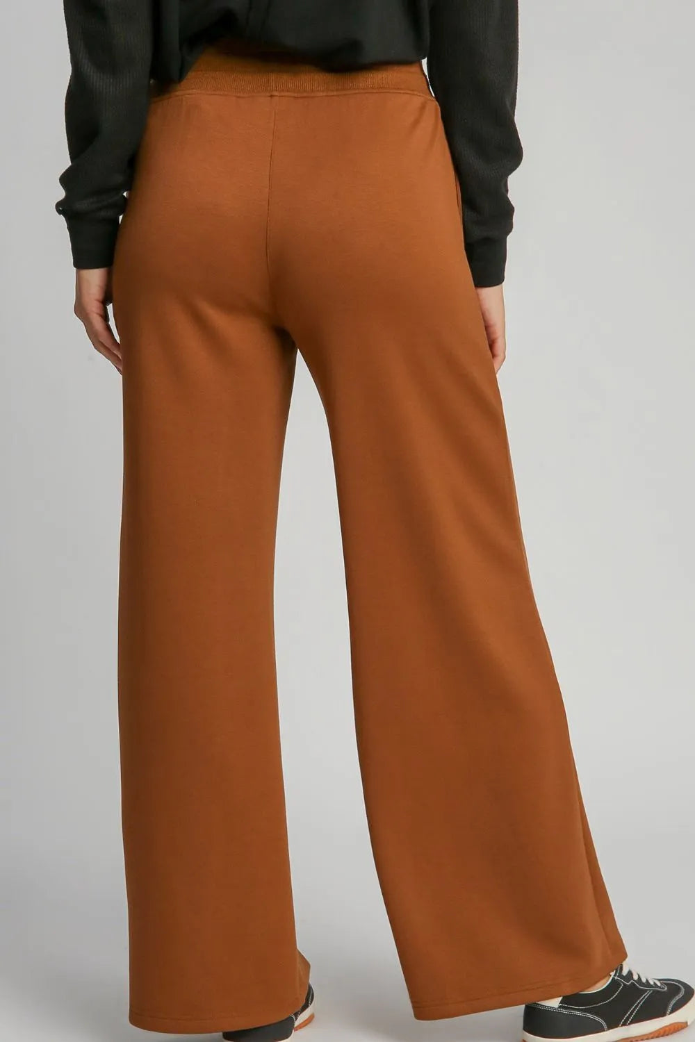 Terracotta Umgee drawstring wide-leg pants with pockets, casual style, relaxed fit, and comfortable fabric.