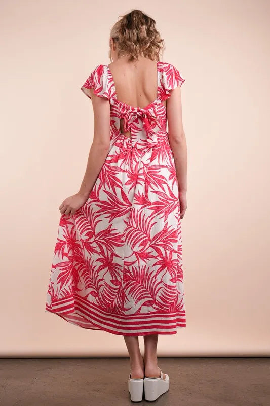 Tropical printed midi boho dress by Trendsi featuring vibrant tomato mix colors and lightweight summer fabric.