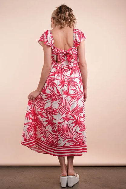 Tropical printed midi boho dress by Trendsi featuring vibrant tomato mix colors and lightweight summer fabric.