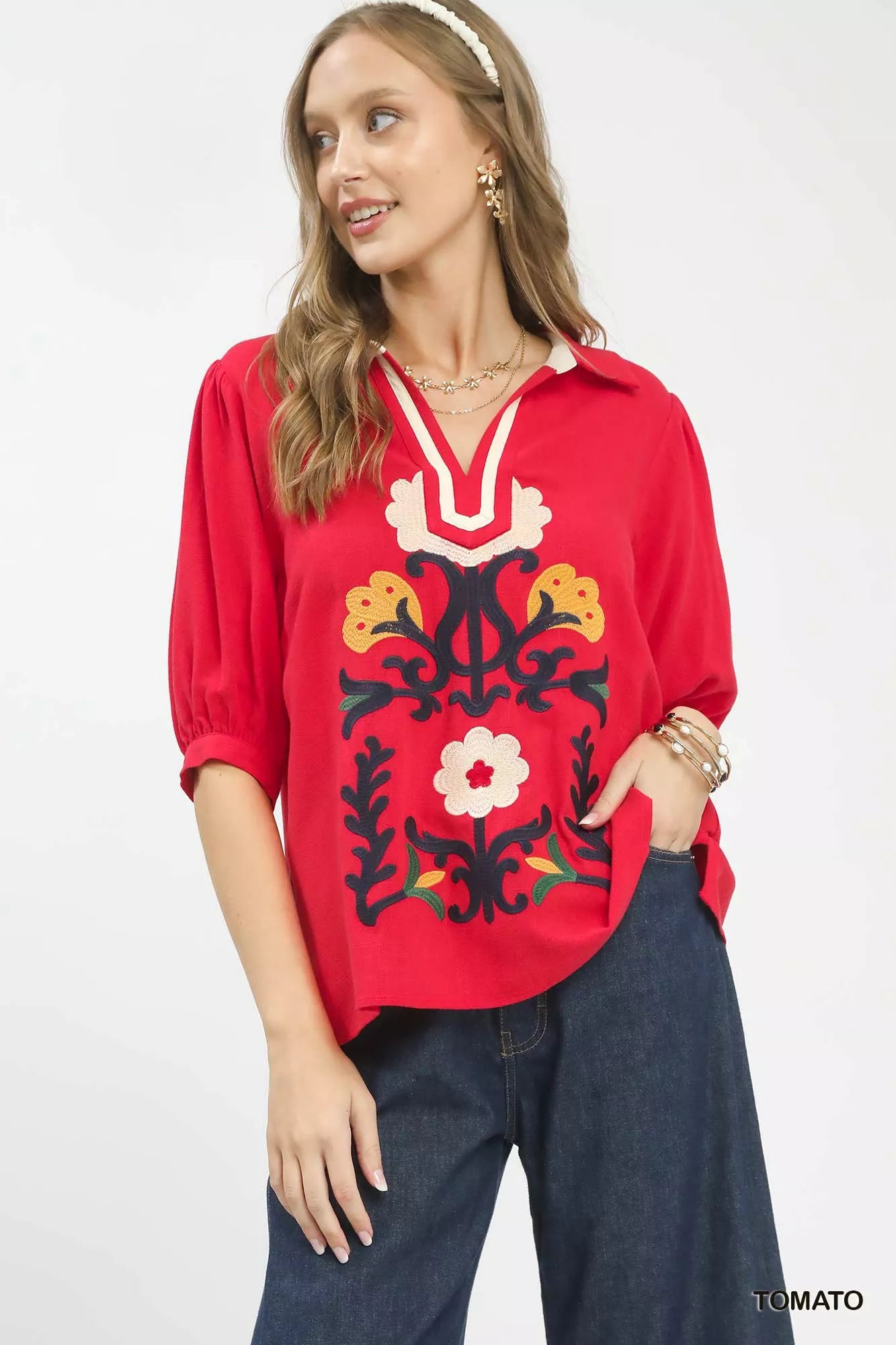 Umgee Mixed Media V-Neck Print Blouse with floral and abstract patterns, stylish women’s top in vibrant colors.