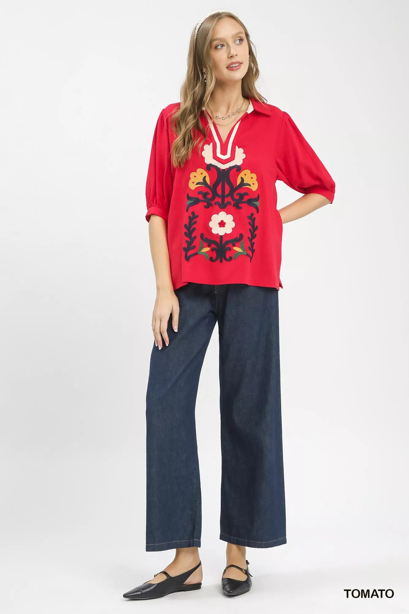 Umgee mixed media V-neck print blouse with long sleeves, featuring a stylish, colorful design perfect for casual or dressy outfits.