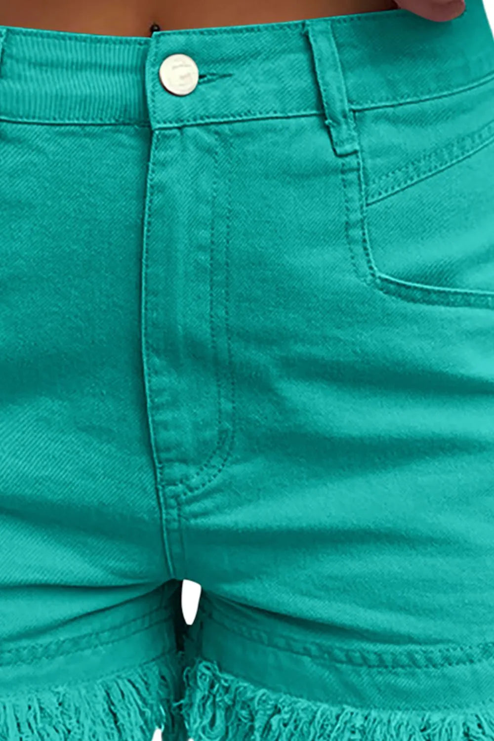 Turquoise raw hem high waist denim shorts by Trendsi, displayed on a model, showing stylish cut and classic denim texture.